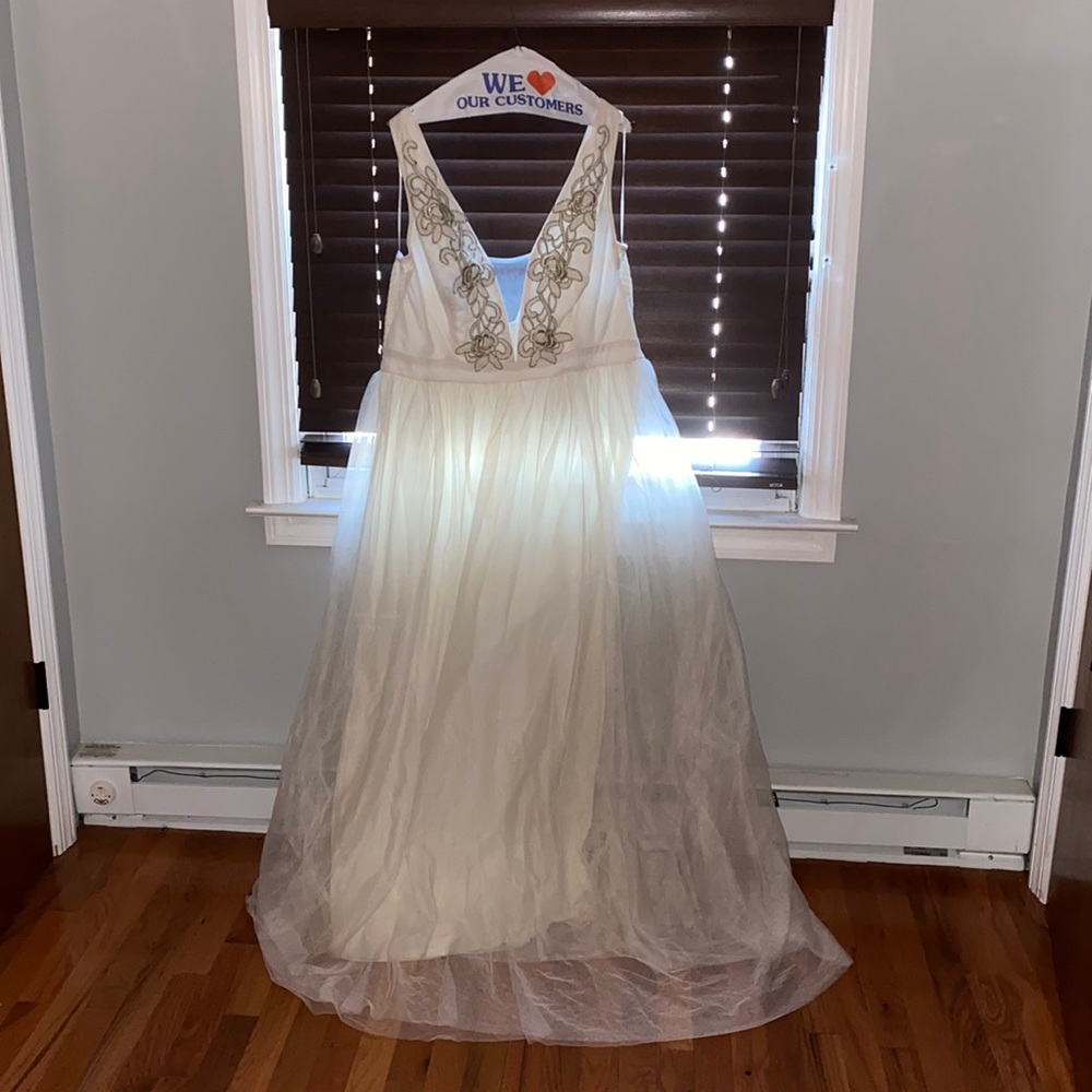White lace floor length gown